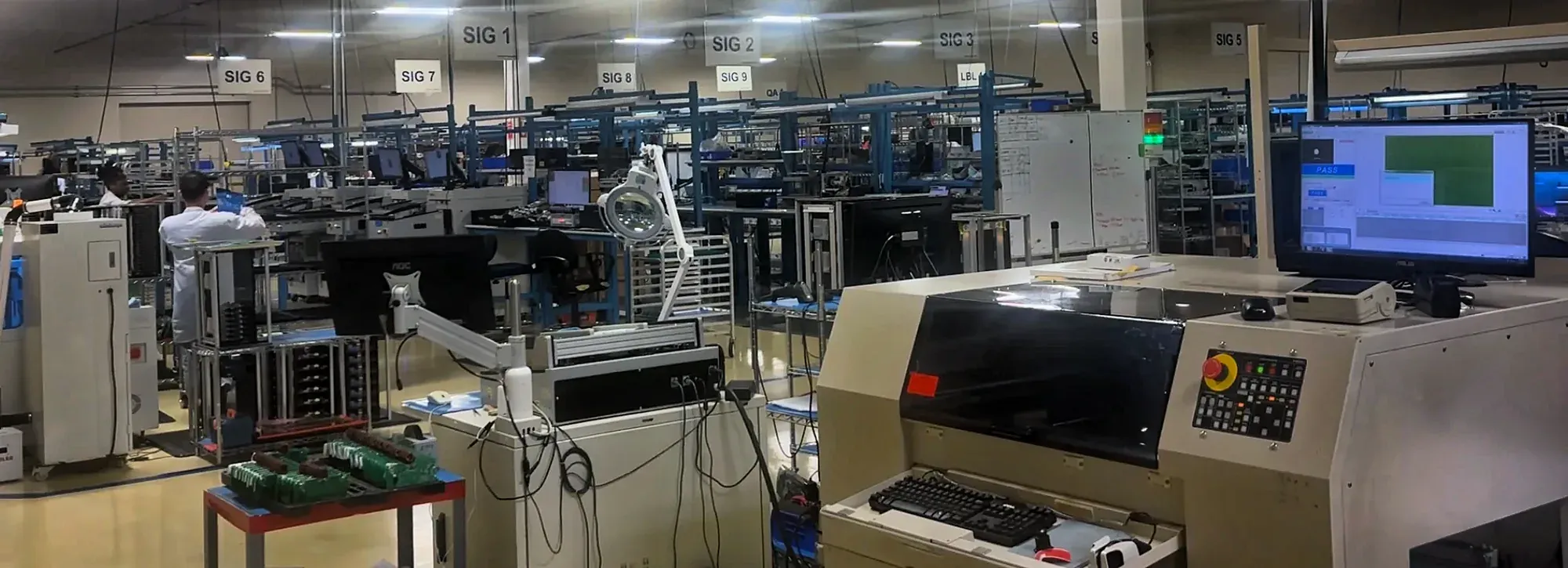 Electronics assembly and test stations on a manufacturing floor